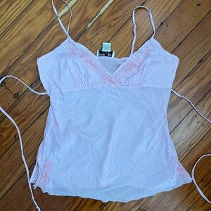 Y2k baby pink cami/tank top. Features beaded/sequin details and ties in the back